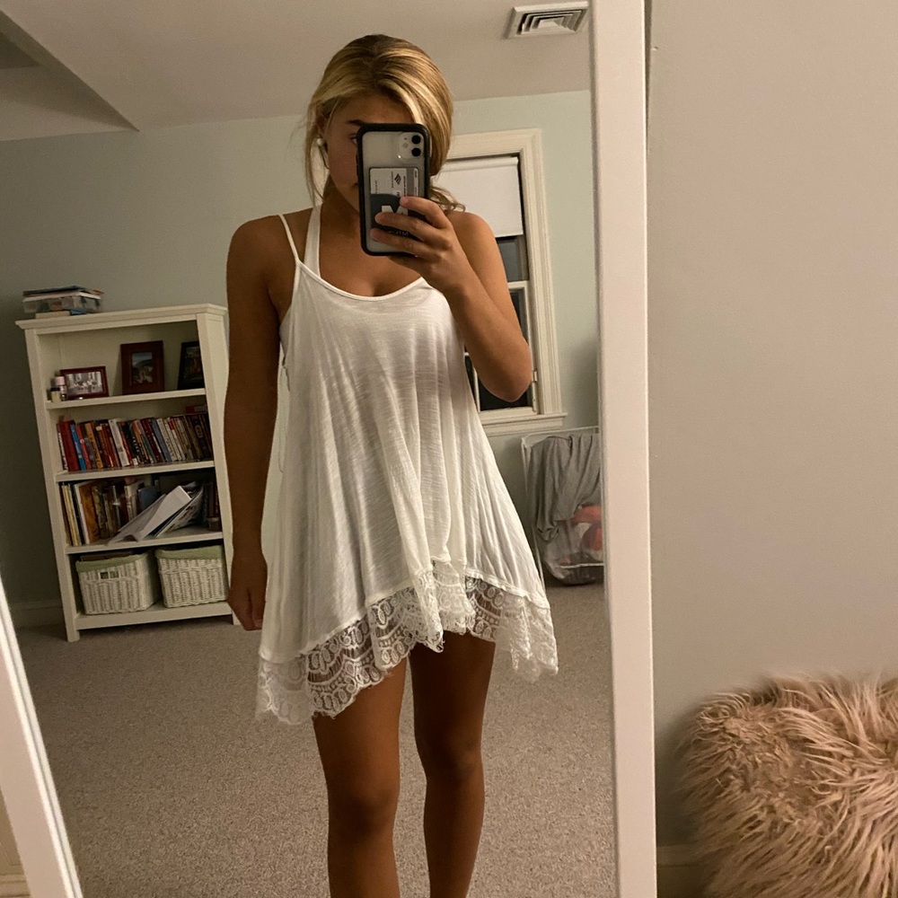 This could be worn as a dress or a cute top!